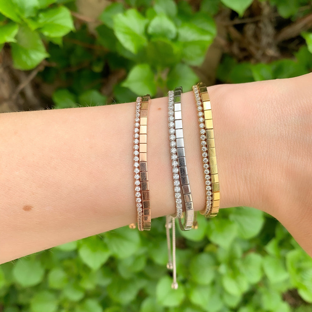 
            
                Load image into Gallery viewer, Mixing the modern square bracelets with our thin cz tennis bracelets at Alexandra Marks Jewelry
            
        