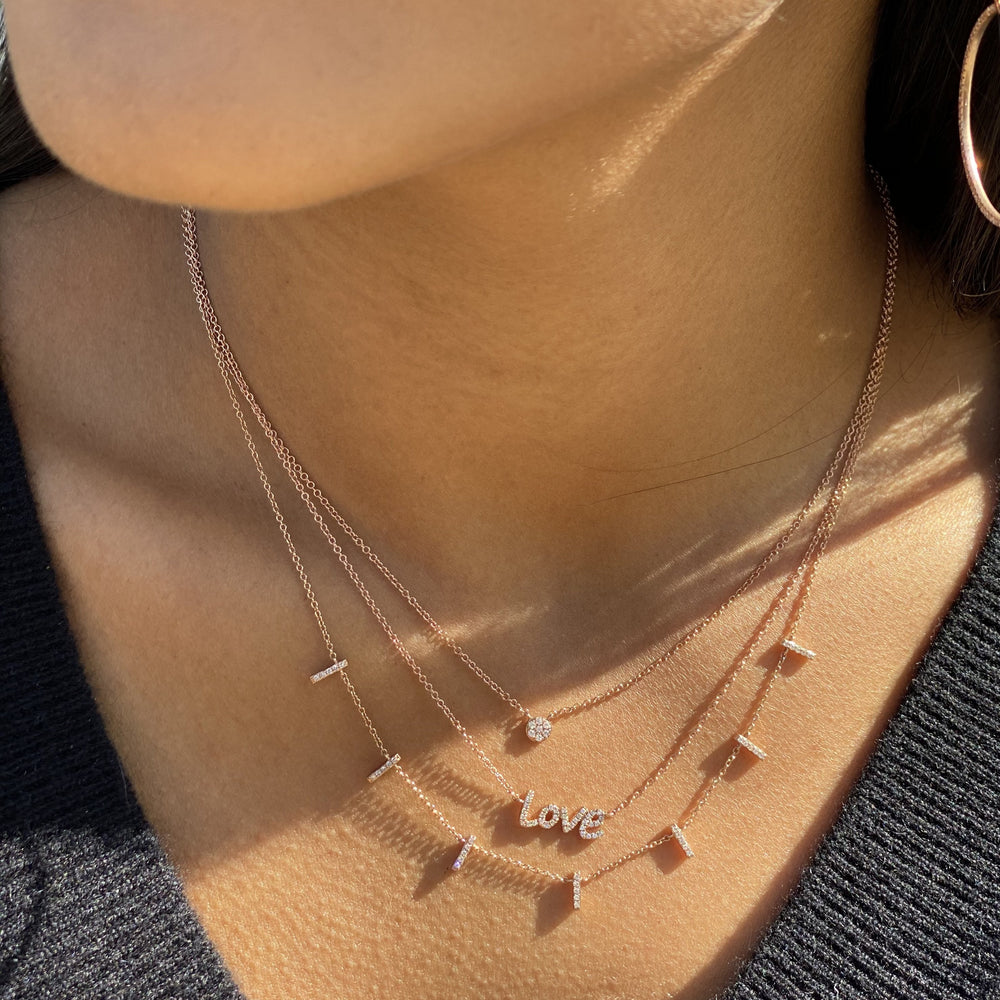 Wearing the 14kt rose gold diamond disc necklace