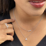Wearing the mini diamond bar necklace in 14kt white gold from Alexandra Marks Jewelry