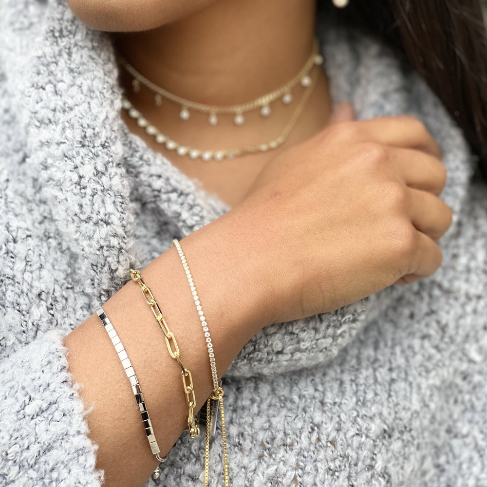 Wearing the thin gold cz tennis bracelet from Alexandra Marks Jewelry