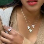 Model wearing our pointed pave' cz heart jewelry from Alexandra Marks