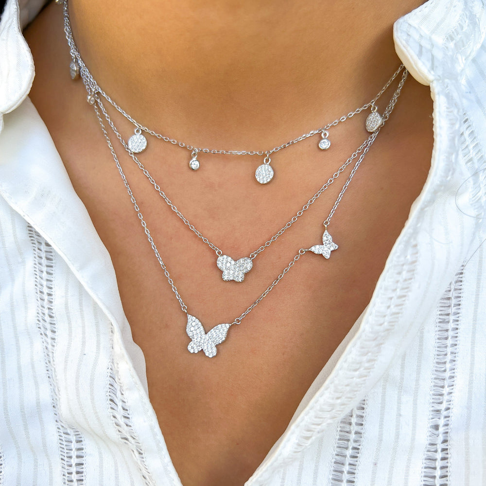 
            
                Load image into Gallery viewer, Mini silver butterfly necklace from Alexandra marks jewelry
            
        