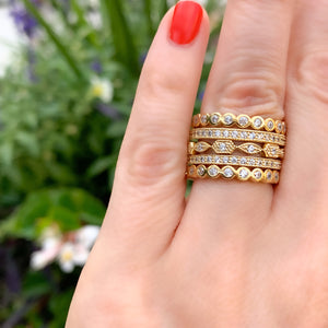 
            
                Load image into Gallery viewer, Stacking our dainty gold cz eternity band rings from Alexandra marks 
            
        
