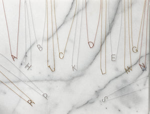 Our best selling plain sideways initial necklaces in rose gold, silver and gold. 