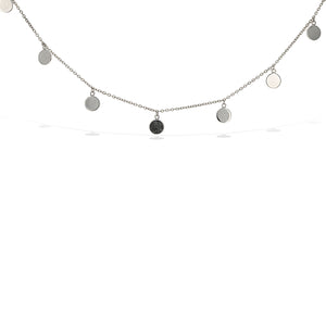 Silver high polished discs hang from a thin silver chain