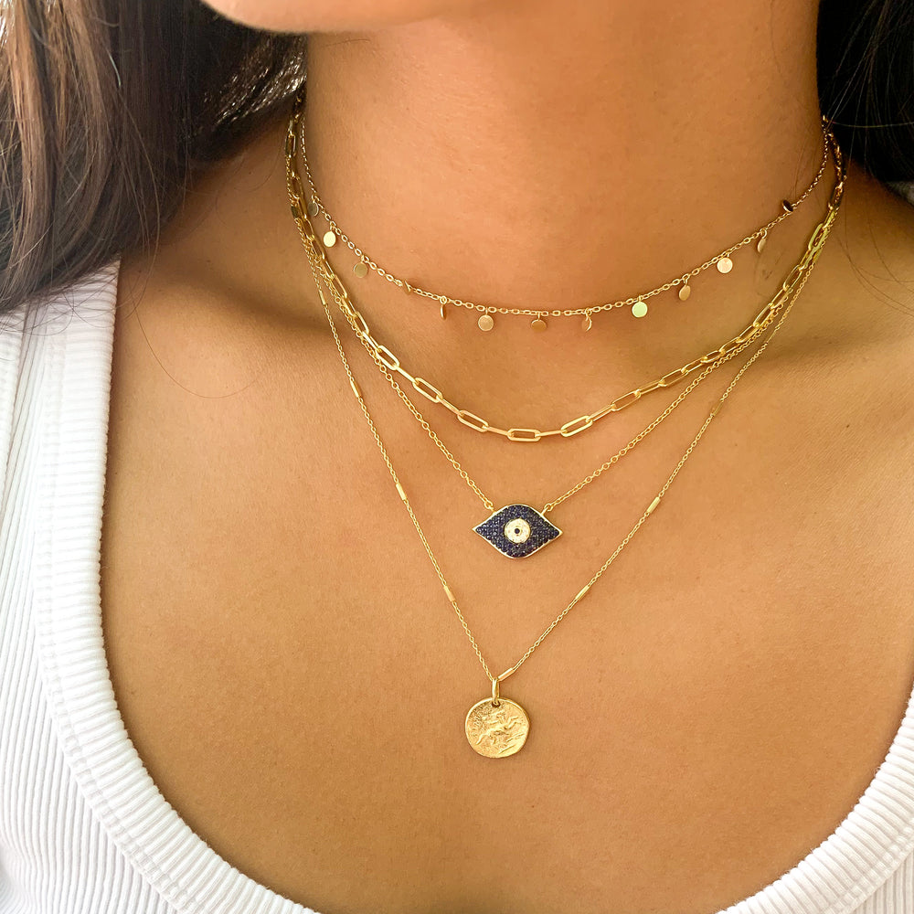 
            
                Load image into Gallery viewer, Wearing the pave&amp;#39; cz gold evil eye necklace from Alexandra Marks Jewelry
            
        