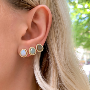 Stacking the labradorite gemstone stud earrings from Alexandra Marks Jewelry