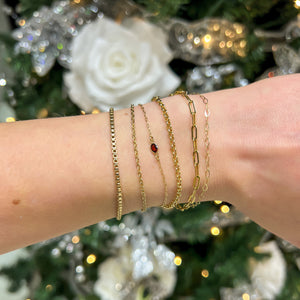Stacking gold permanent bracelets from Alexandra Marks Jewelry