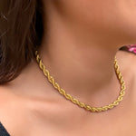 Wearing the gold rope choker necklace from alexandra marks jewelry