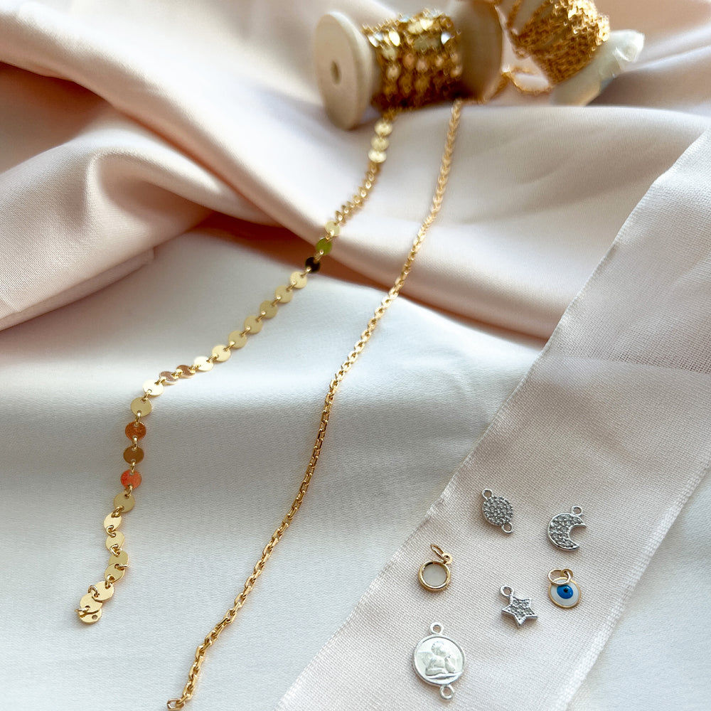 New gold bracelet chain and charms from Alexandra Marks Jewelry