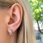 Wearing the sterling silver and cz vine huggie hoop earrings from Alexandra Marks Jewelry